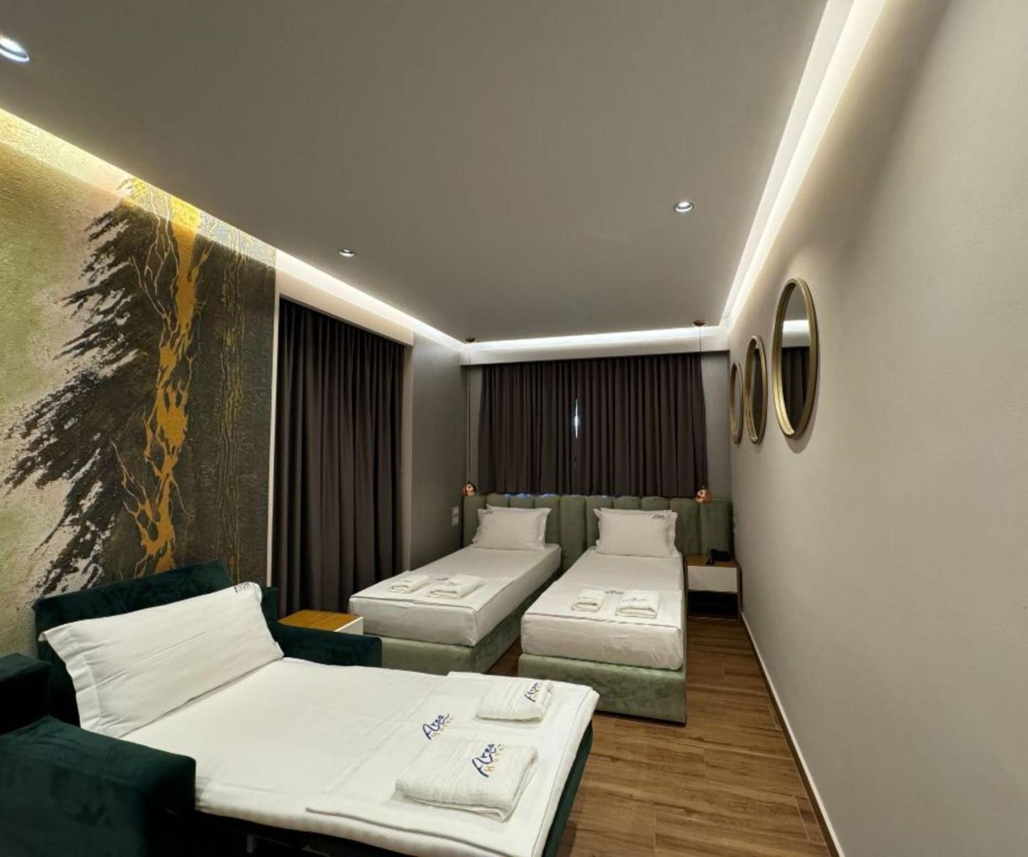 Area Hotel Ксамил Экстерьер фото