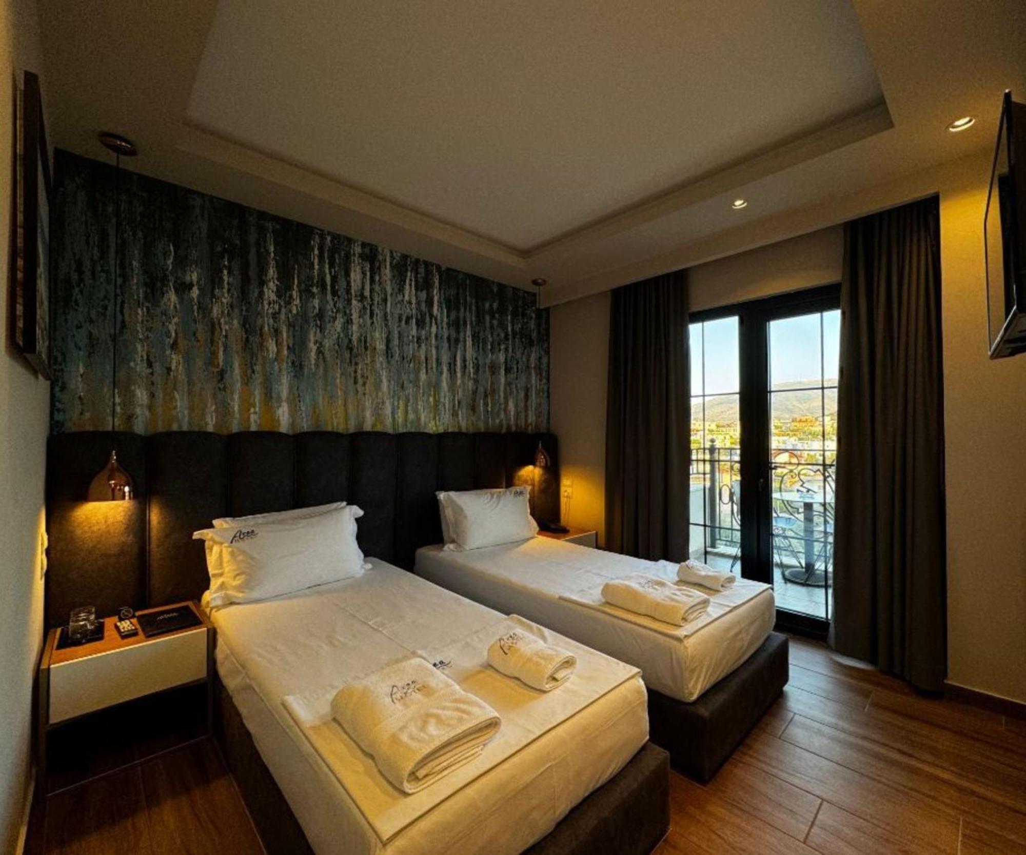 Area Hotel Ксамил Экстерьер фото