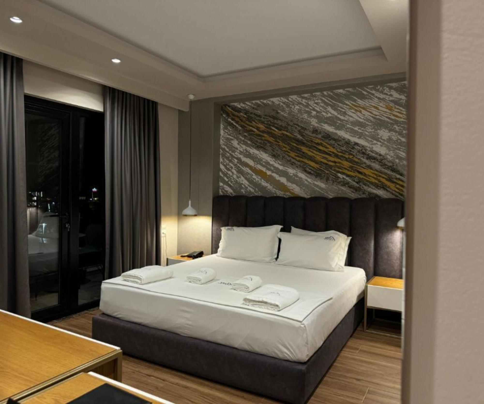 Area Hotel Ксамил Экстерьер фото