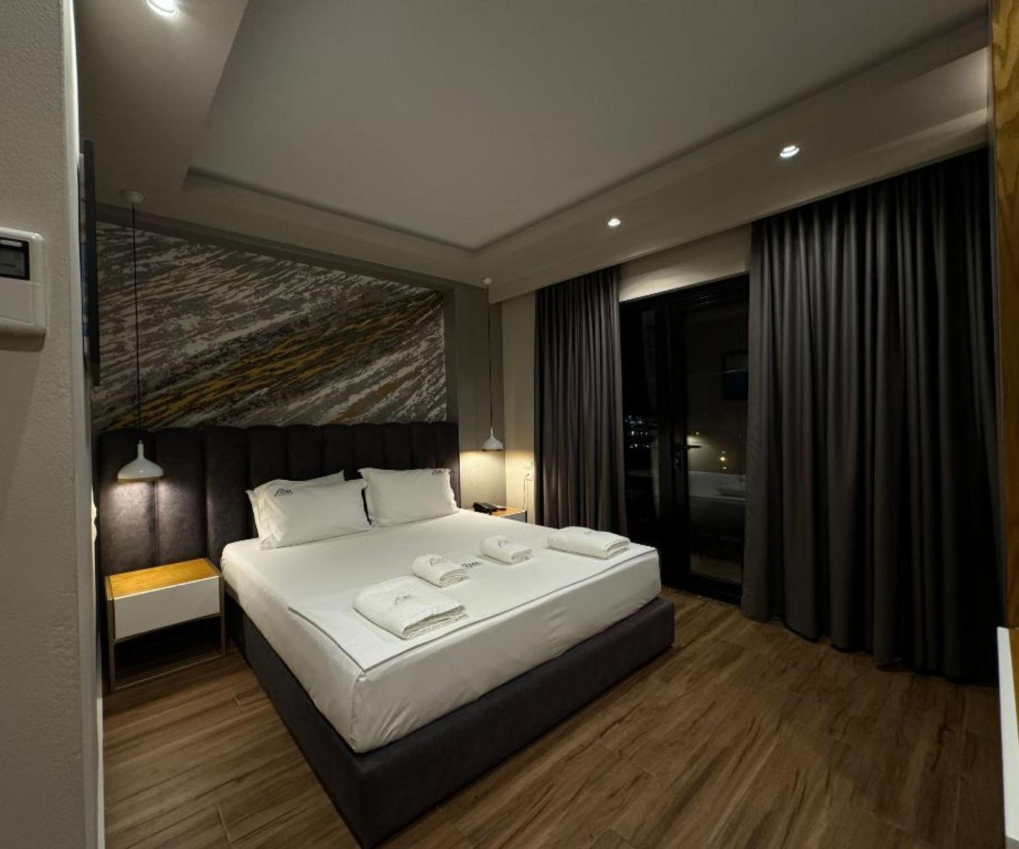 Area Hotel Ксамил Экстерьер фото
